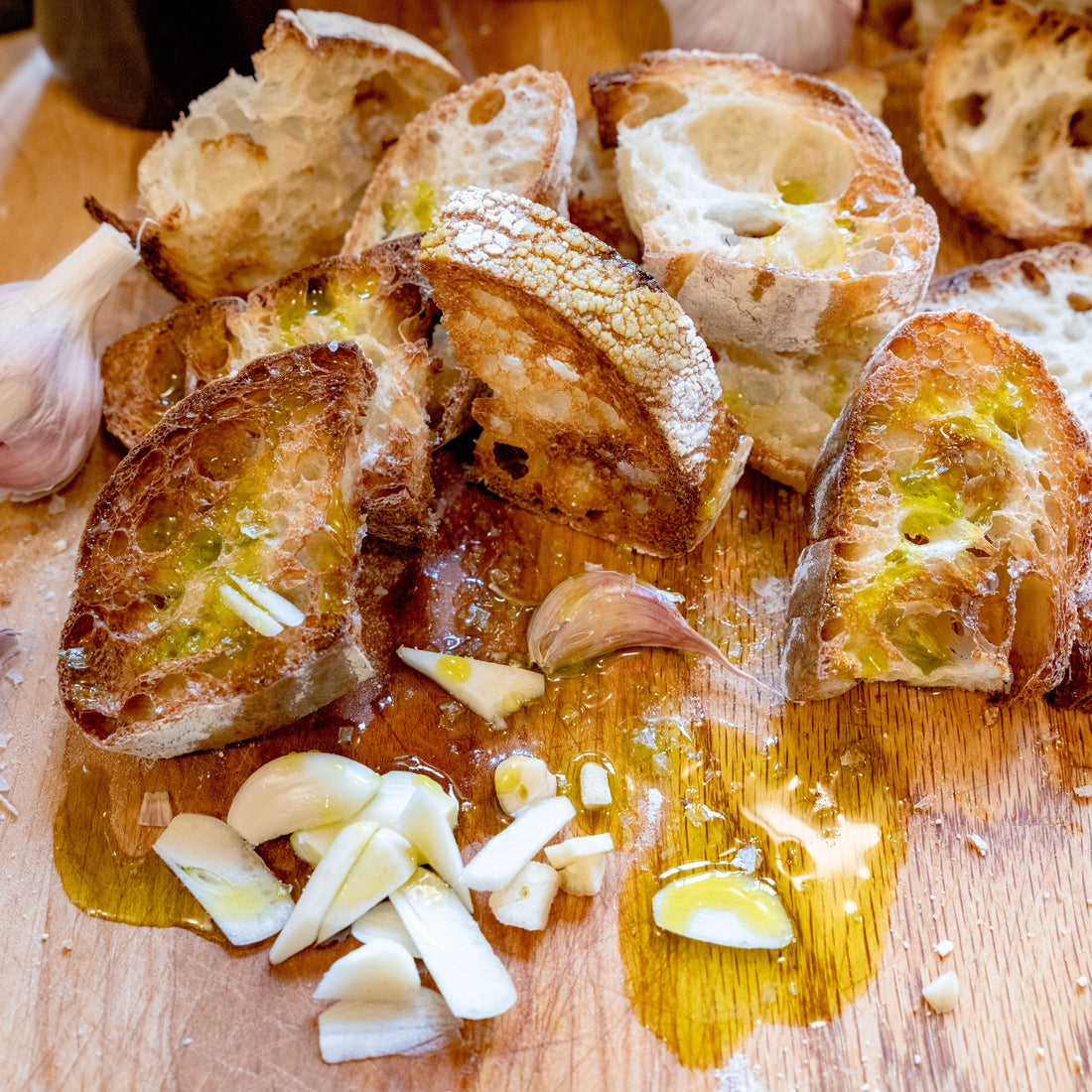 Classic Bruschetta, open celled bread rubbed with garlic and drenched in new harvest olive oil
