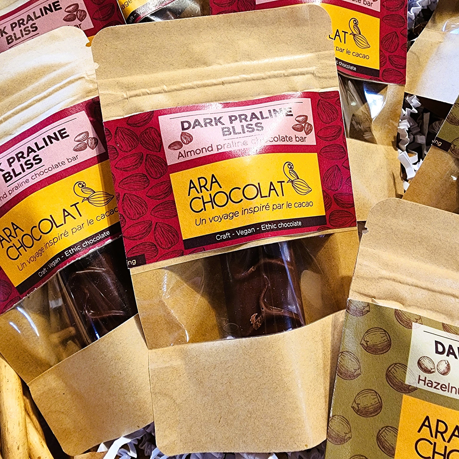 Ara Chocolat chocolate bars in packaging with visible branding.