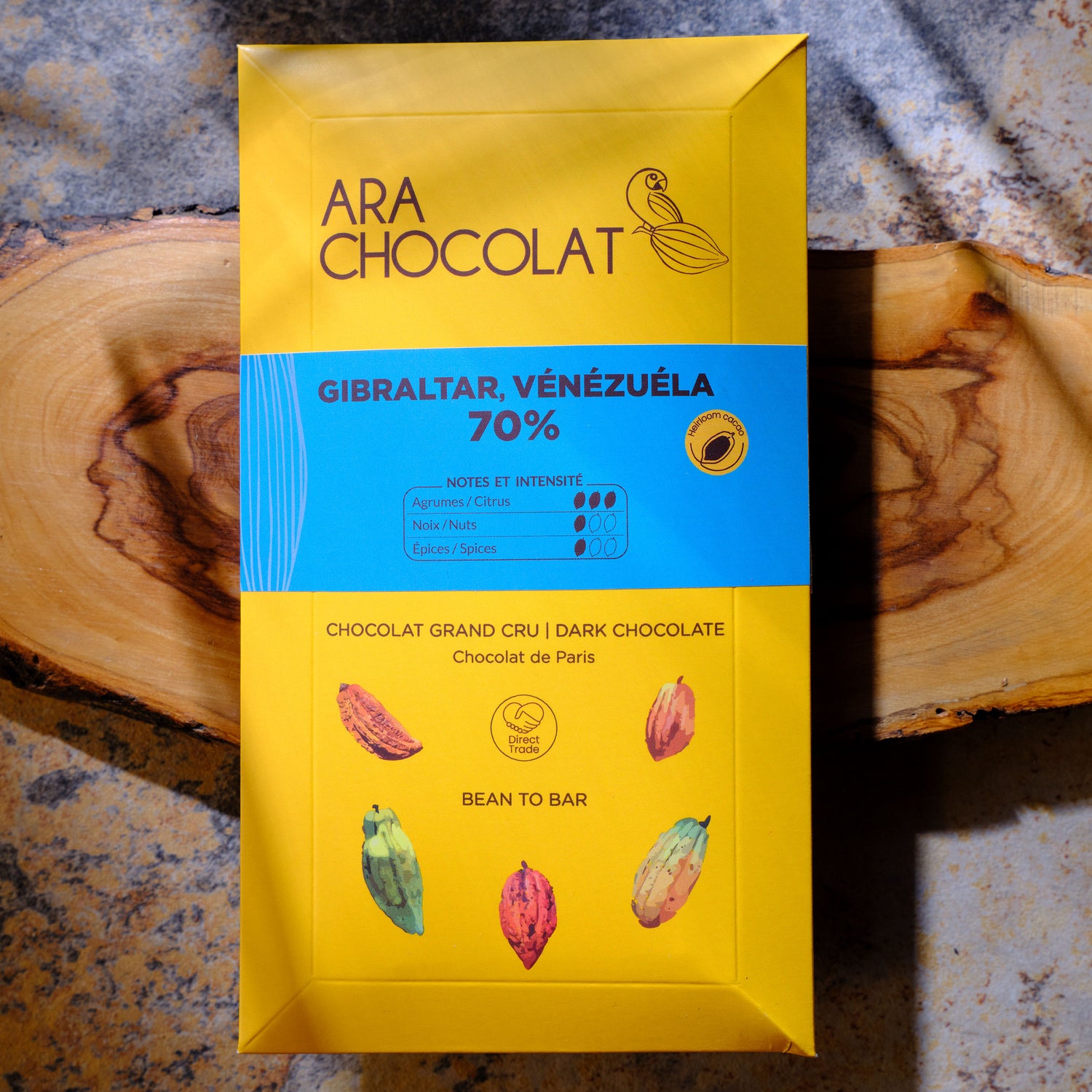 ARA CHOCOLAT chocolate packaging on a wooden surface Ara Chocolat Gibraltar 70% Dark Chocolate Bar
