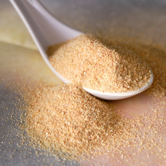 Organic Granulated Garlic spoon close