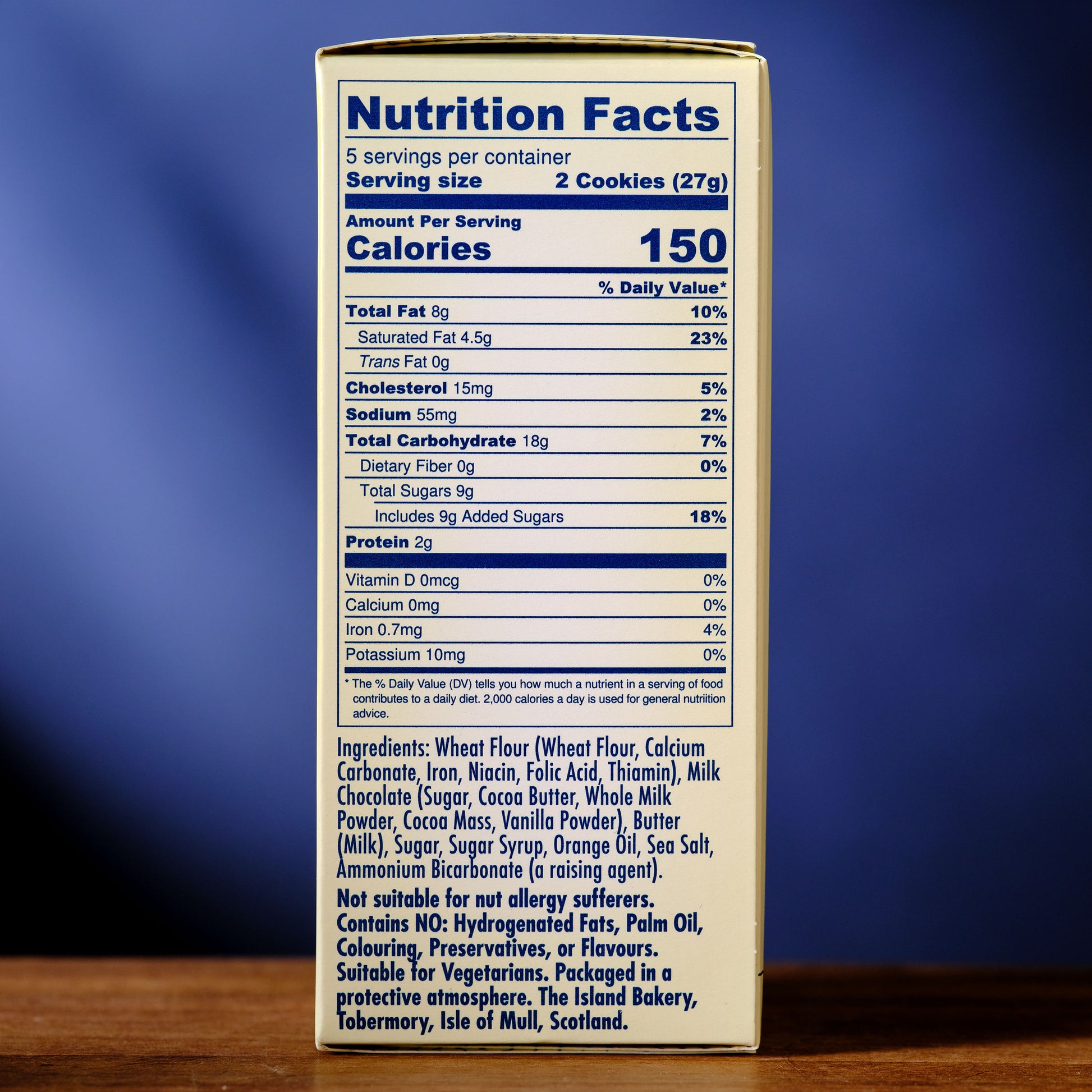 Nutrition facts label on a box of cookies with a blue background Island Bakery Orange Melts Shortbread Cookie with Milk Chocolate