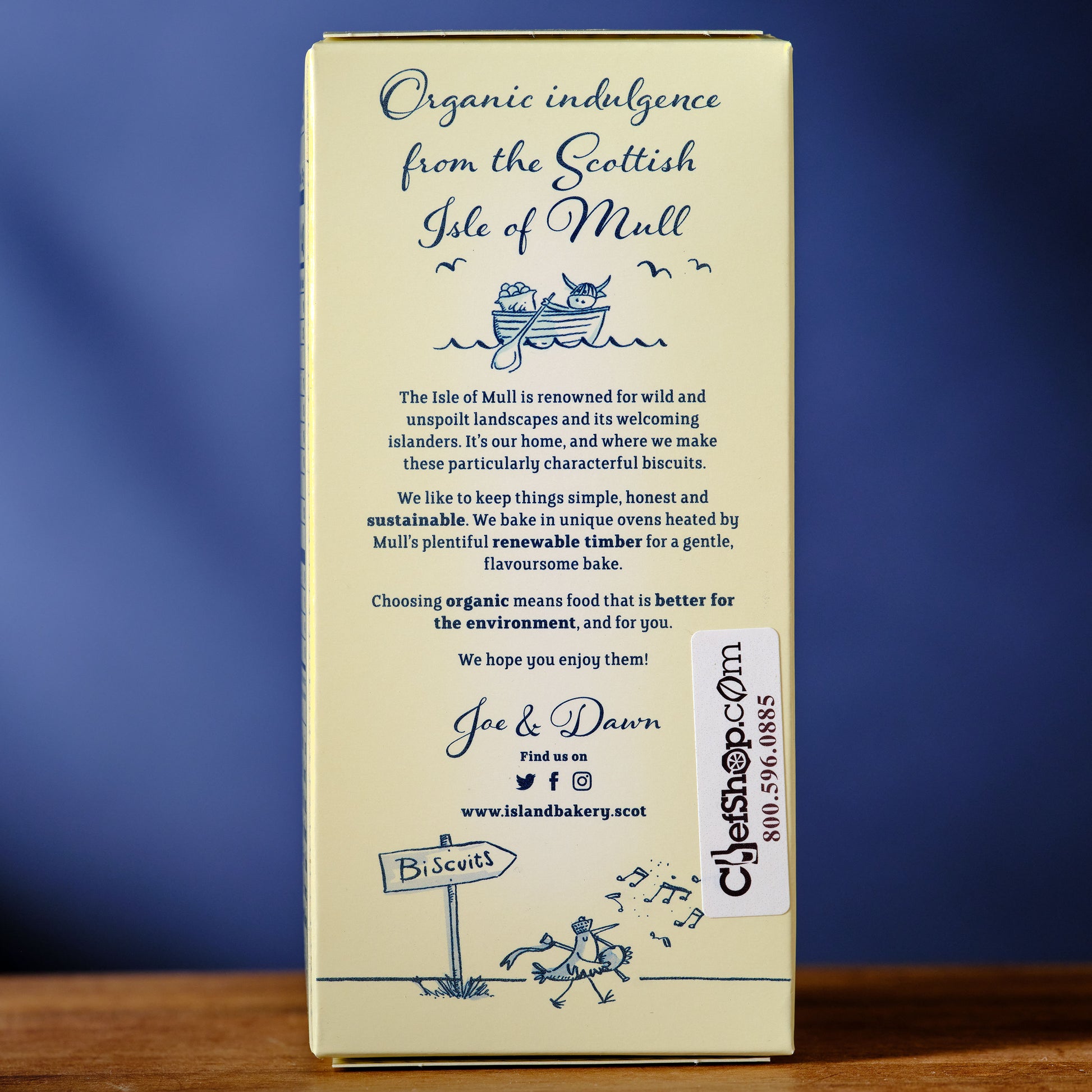 Box of organic biscuits from the Scottish Isle of Mull with text and branding on a blue background. Island Bakery Shortbread Biscuits