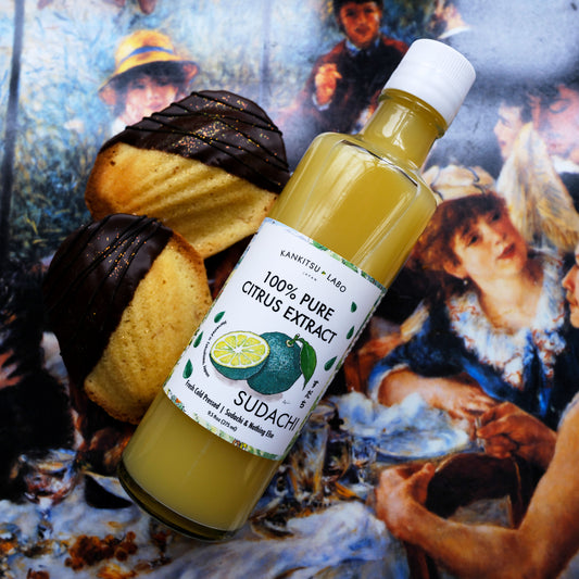 Bottle of 100% pure citrus extract labeled 'Sudachi' on a classical painting background. Labo 100% Pure Cold-Pressed Sudachi Extract