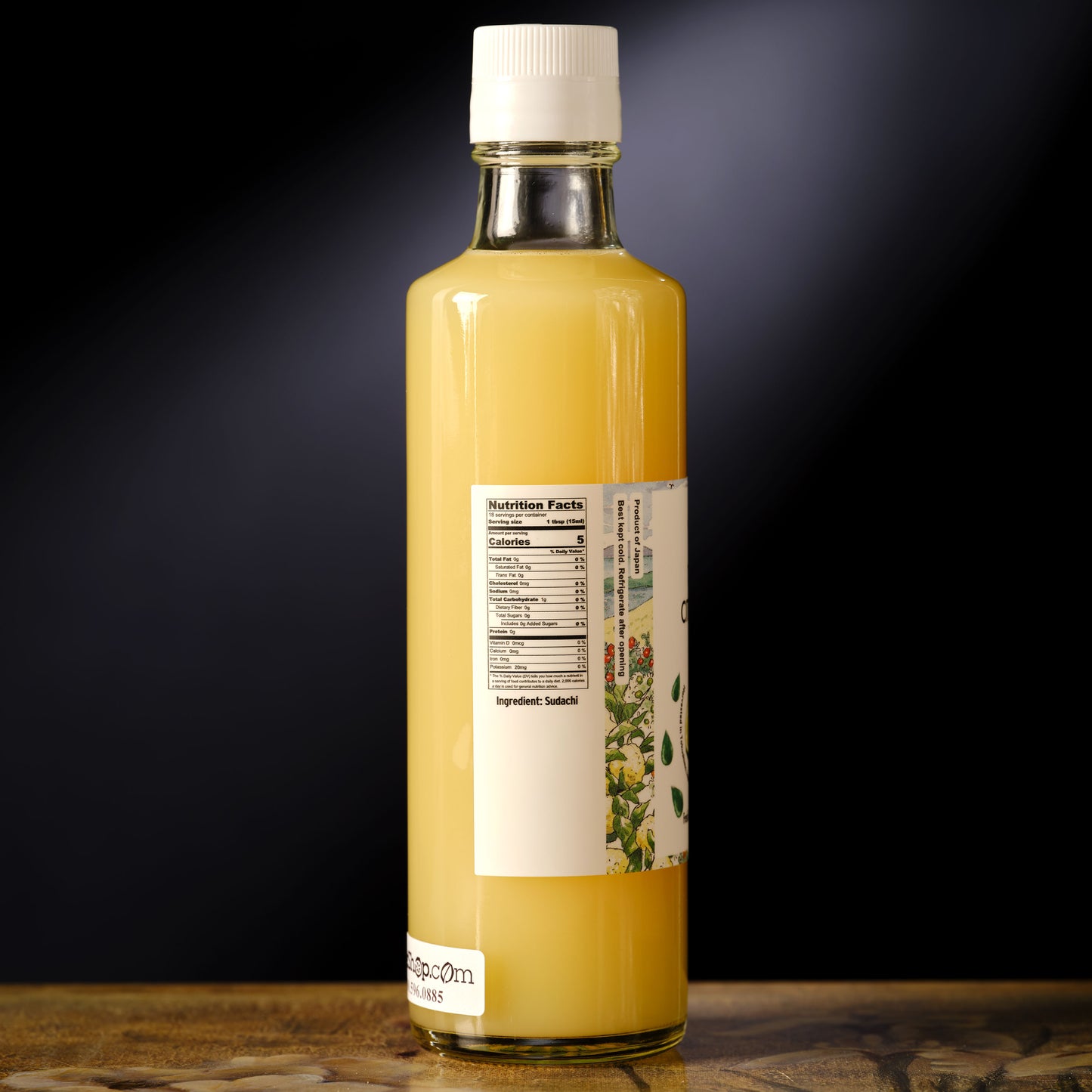 Bottle of Labo 100% Pure Cold-Pressed Sudachi Extract on a dark background