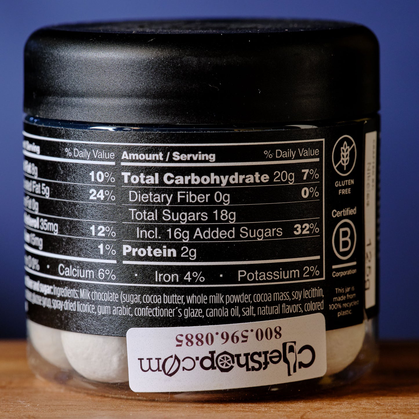 Jar with nutritional label on a wooden surface Lakrids Frozen Mint Chocolate Coated Licorice