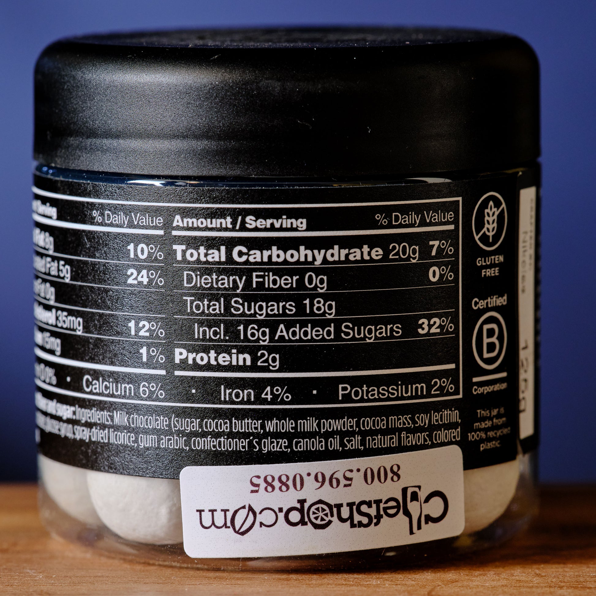 Jar with nutritional label on a wooden surface Lakrids Frozen Mint Chocolate Coated Licorice