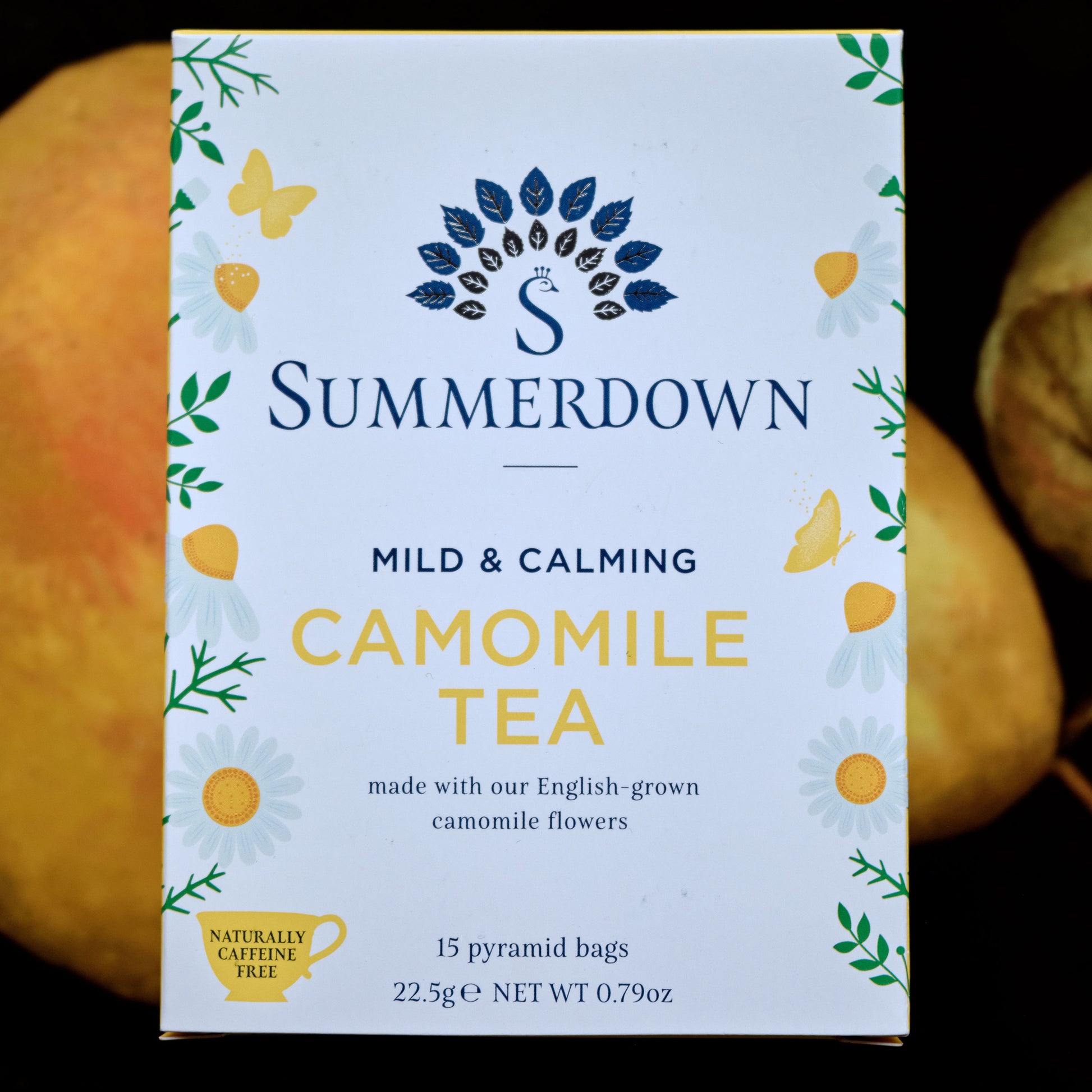 Summerdown Camomile Tea on pear background