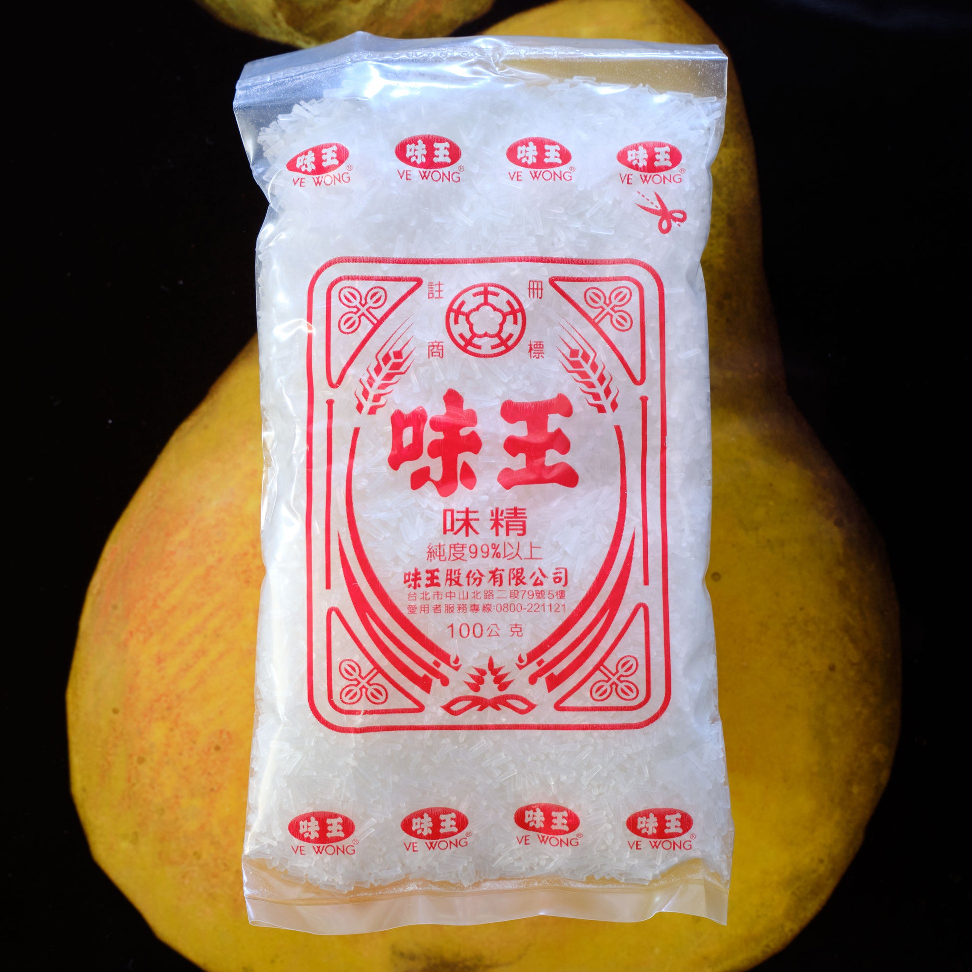Packaged product with red and white label on a dark background Ve Wong MSG - Monosodium L-glutamate